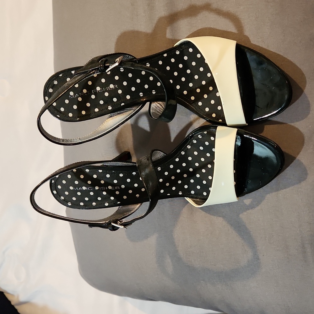 8.5 Black and White Patent Leather open toe.